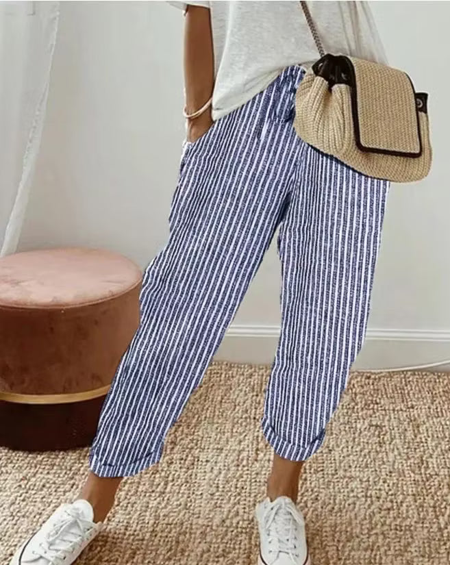 Letnie, pasiaste spodnie w stylu casual z luźnym, sztywnym paskiem