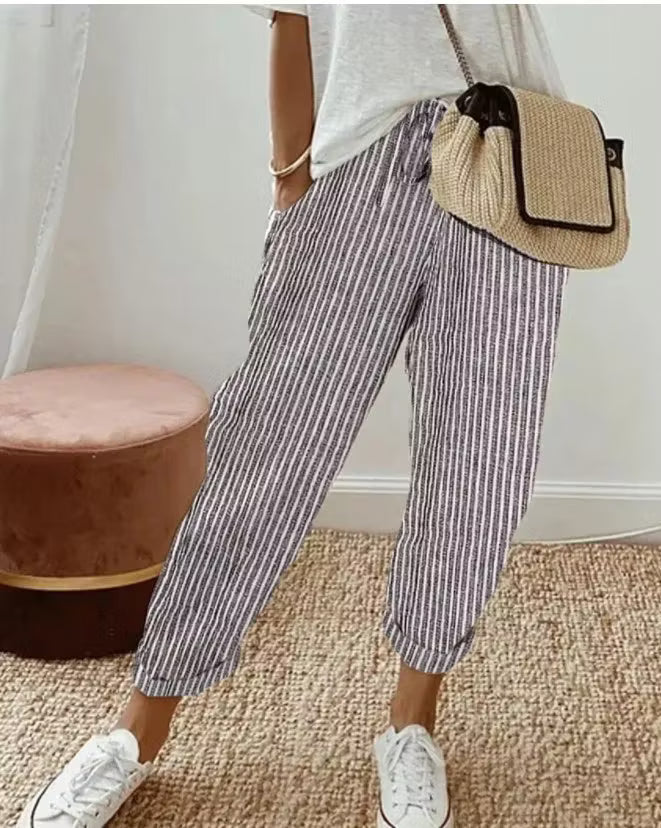 Letnie, pasiaste spodnie w stylu casual z luźnym, sztywnym paskiem